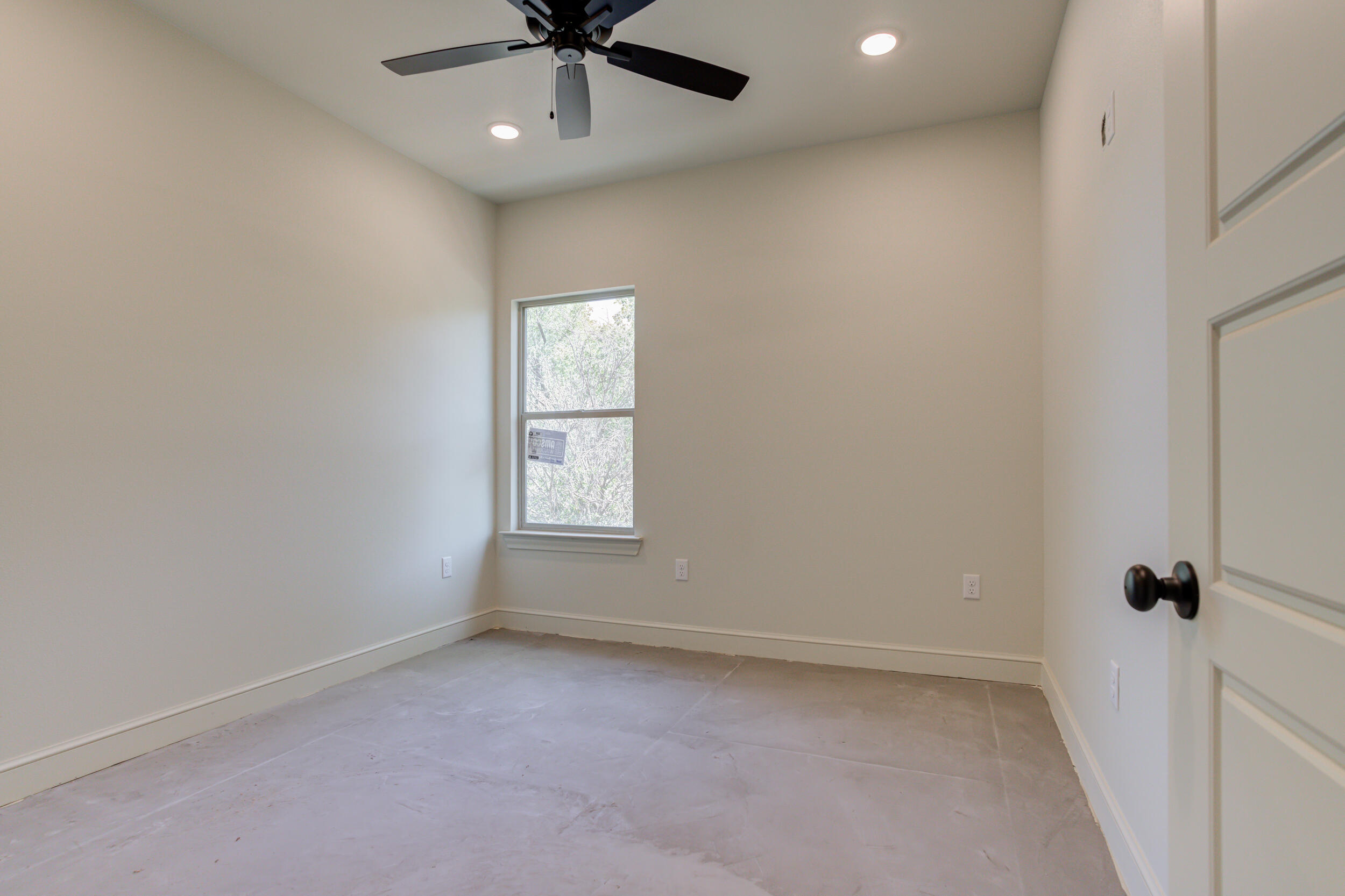 3419 24th Street Lubbock, TX 79410 - Photo 38 of 45 an empty room with a window