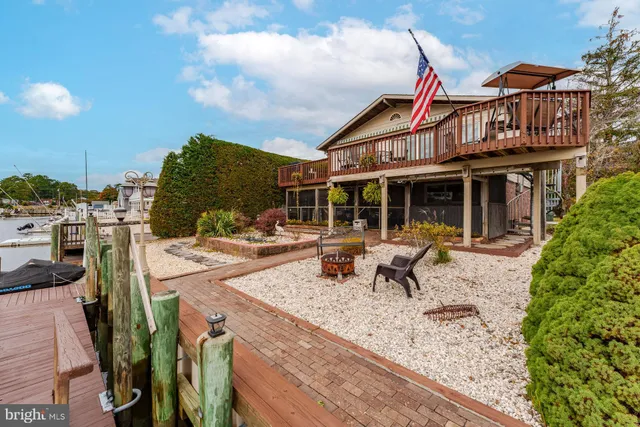 swimming pool view with a seating space