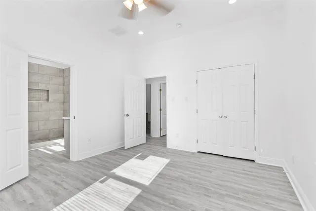 a bathroom with a bathtub and shower