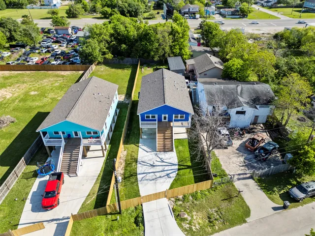 a view of a swimming pool with a lawn chairs