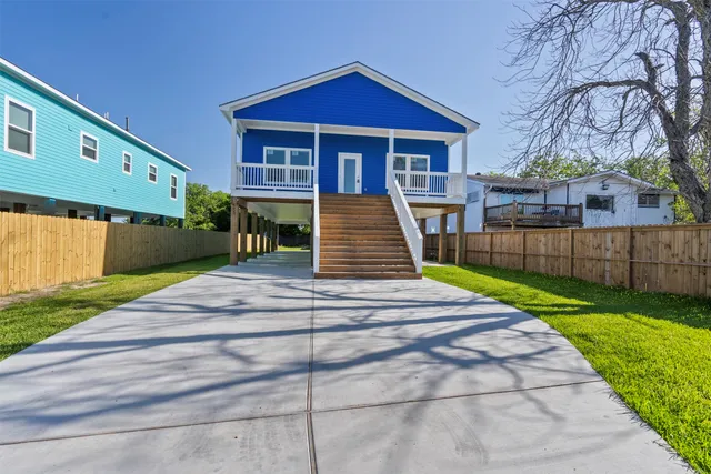 a front view of a house with swimming pool