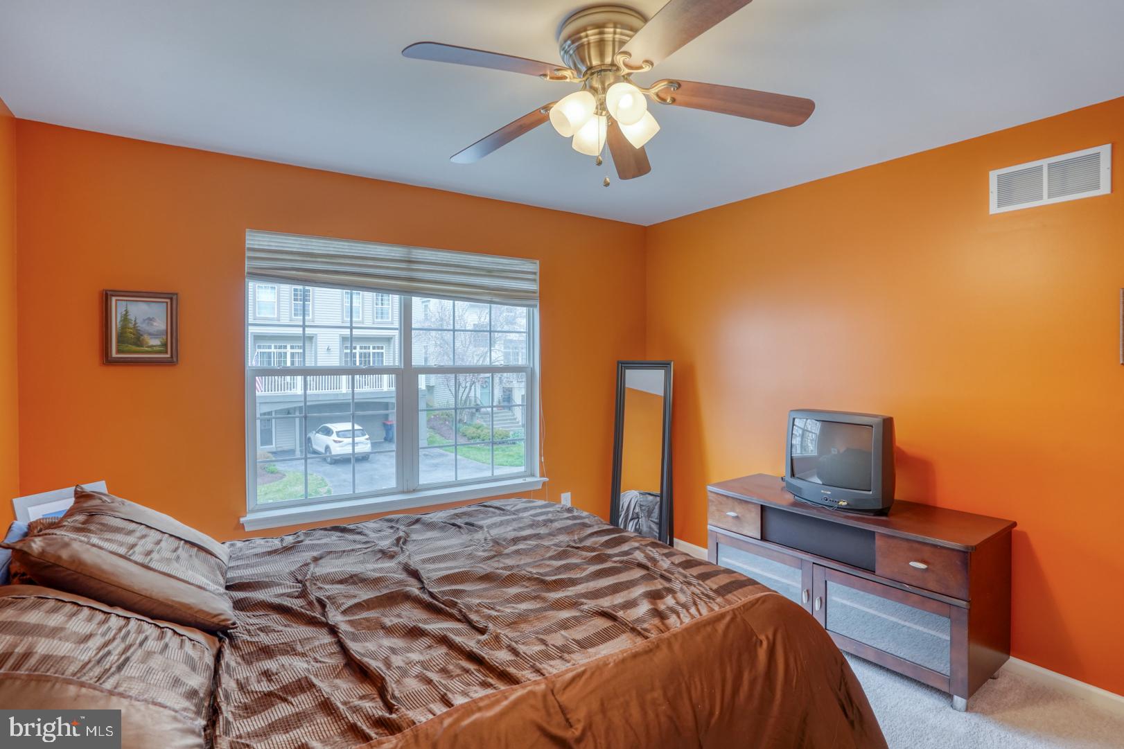 612 Sandy's Parish Road Landenberg, PA 19350 - Photo 36 of 49 a bedroom with a bed window and flat screen tv