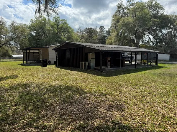 a view of backyard of house