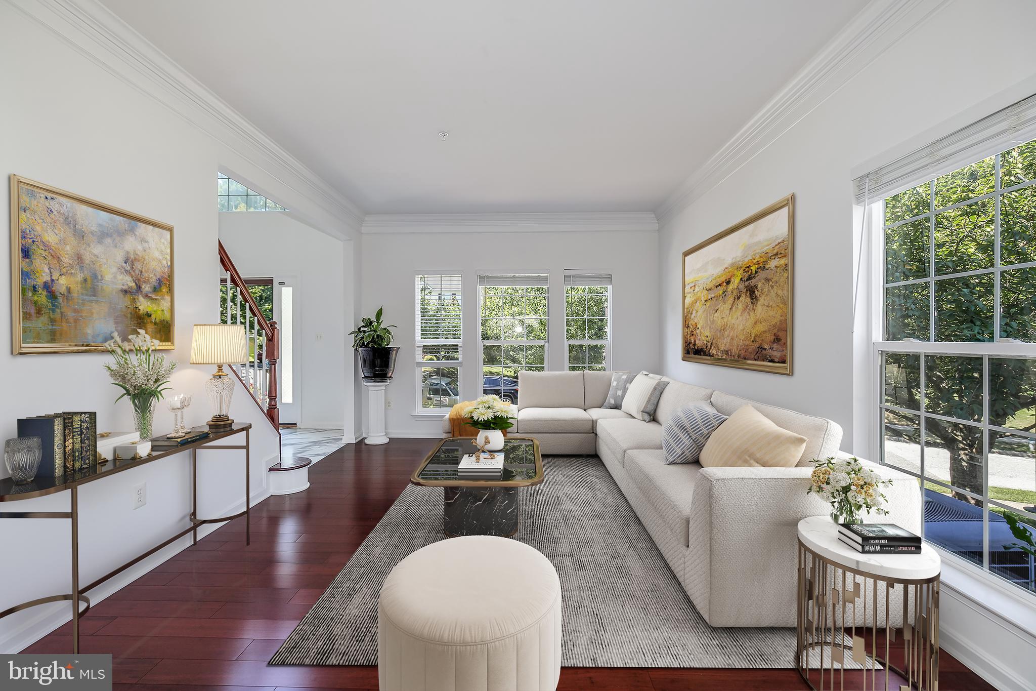 6810 Ashleys Crossing Court Temple Hills, MD 20748 - Photo 16 of 45 a living room with furniture and a large window
