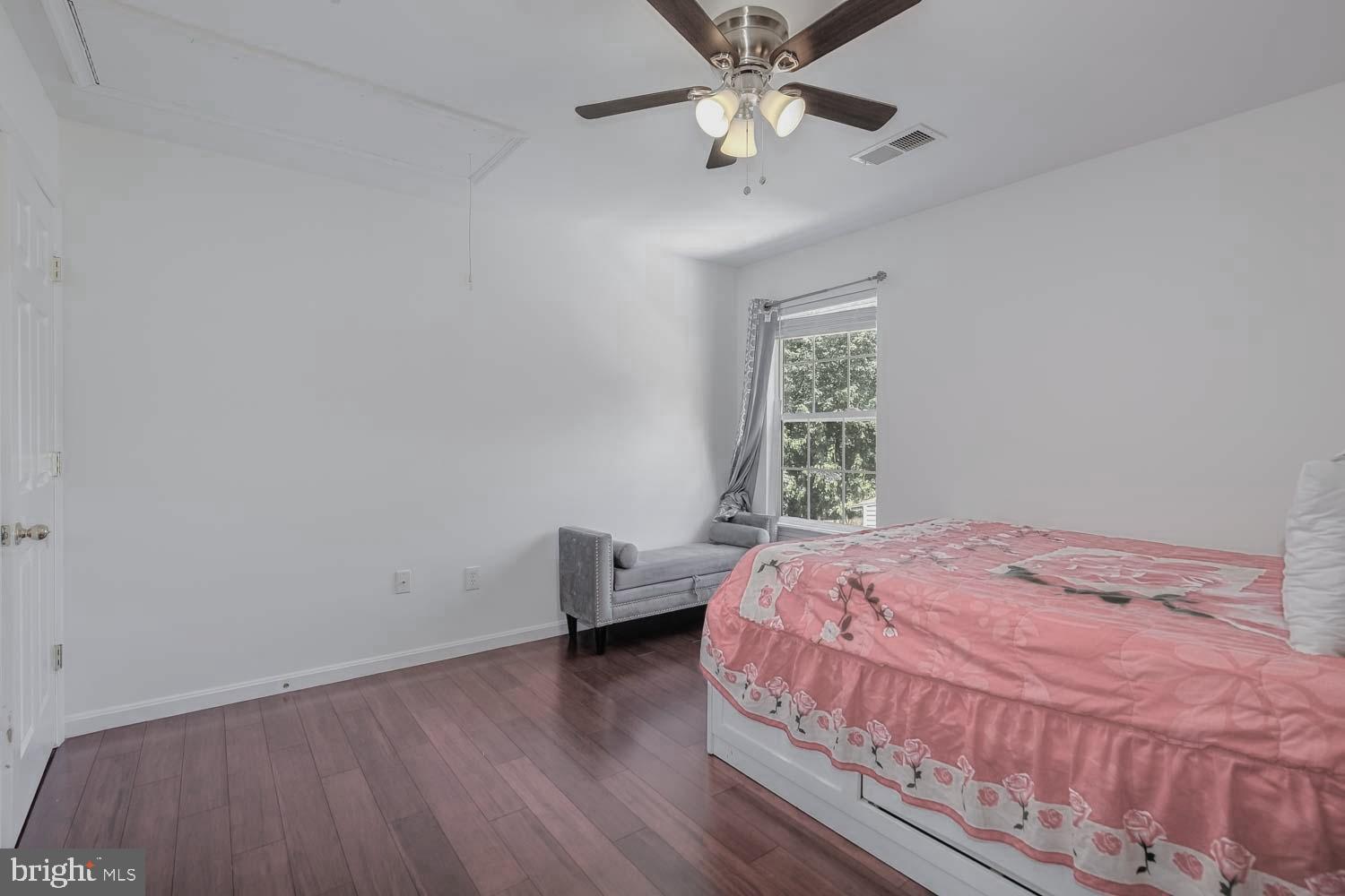 6810 Ashleys Crossing Court Temple Hills, MD 20748 - Photo 33 of 45 a bedroom with a bed and a window