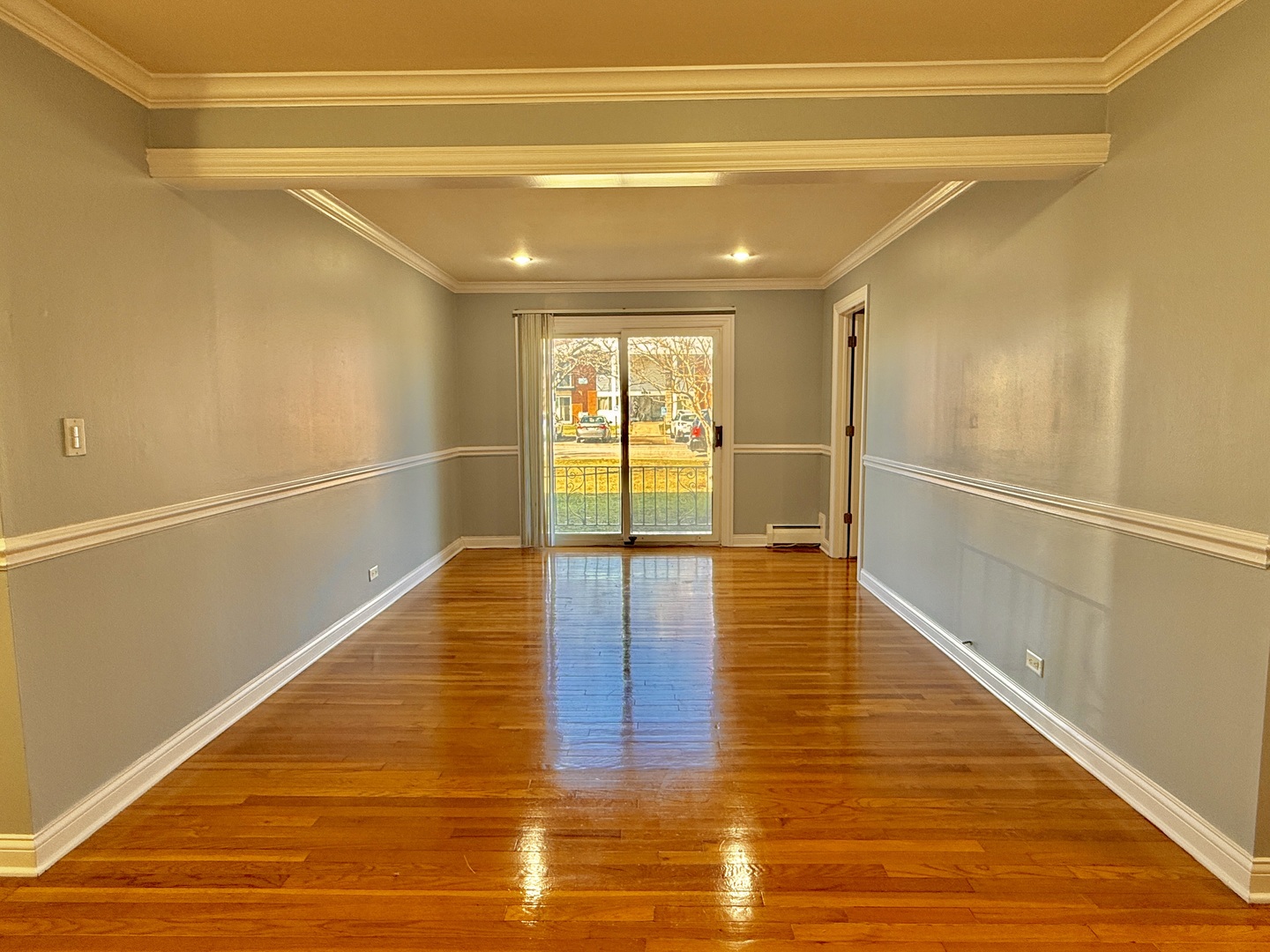9561 Dee Road, Unit 107G Des Plaines, IL 60016 - Photo 9 of 12 a view of empty room with wooden floor
