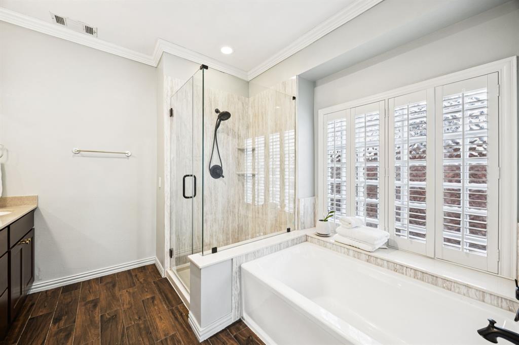 902 Kilgore Court Allen, TX 75013 - Photo 16 of 32 a spacious bathroom with a granite countertop tub sink and shower