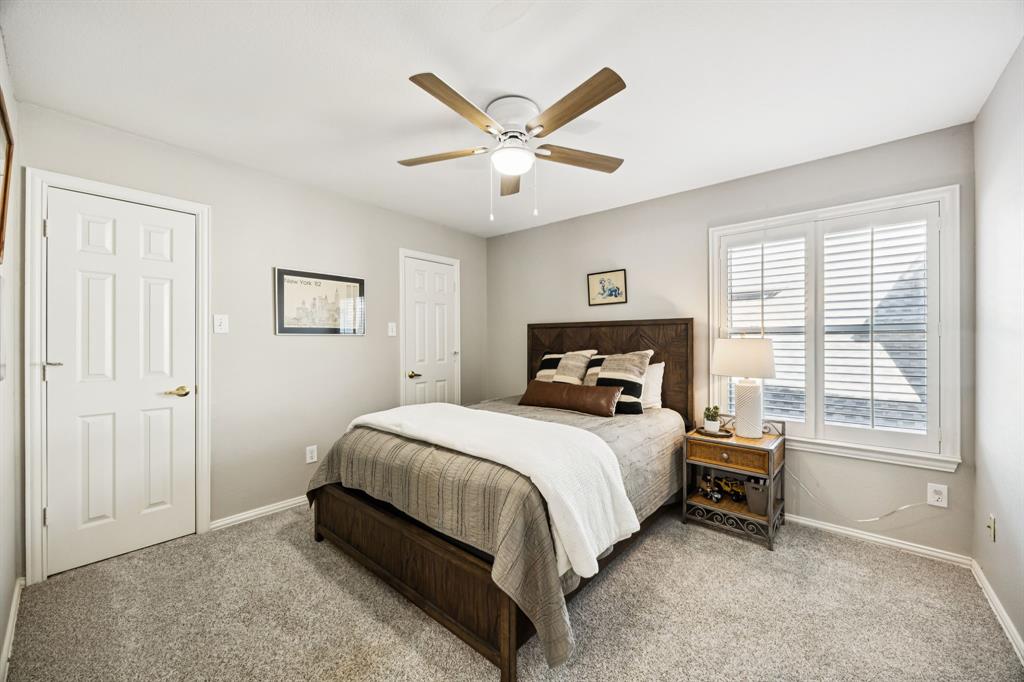 902 Kilgore Court Allen, TX 75013 - Photo 21 of 32 a bedroom with a bed and window