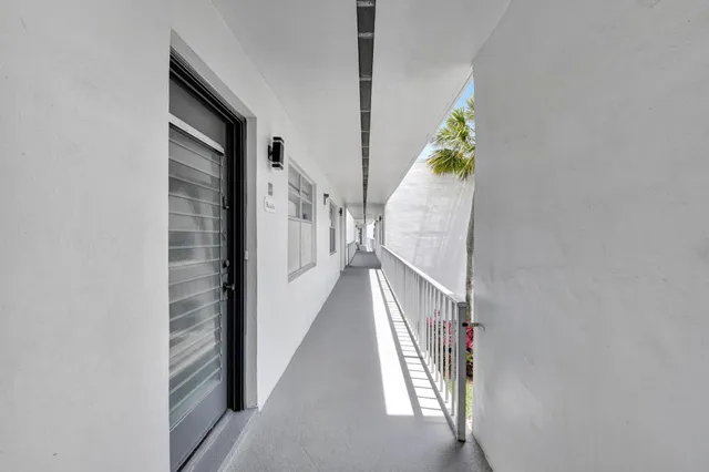 a view of staircase with wooden floor and stairs
