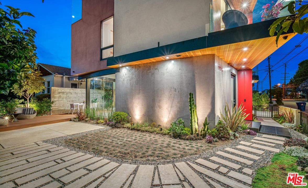 11519 Mississippi Avenue Los Angeles, CA 90025 - Photo 12 of 45 a view of a house with a yard