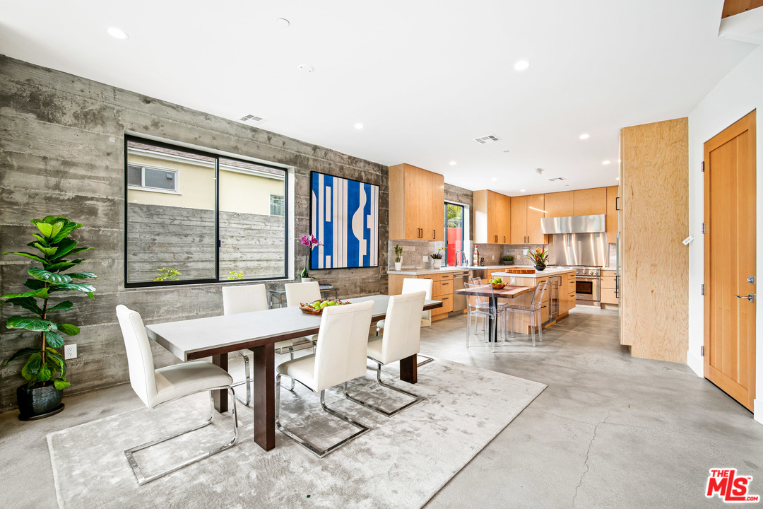 11519 Mississippi Avenue Los Angeles, CA 90025 - Photo 14 of 45 a living room with furniture a window and a potted plants