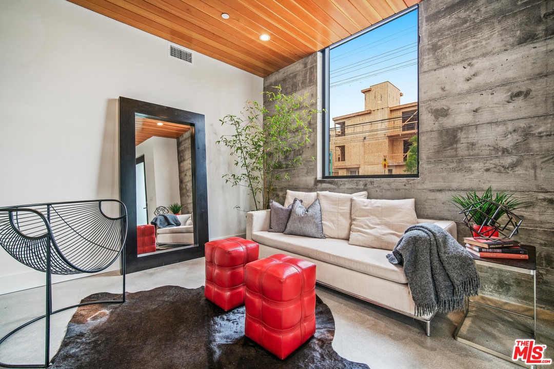 11519 Mississippi Avenue Los Angeles, CA 90025 - Photo 4 of 45 a living room with furniture and a potted plant