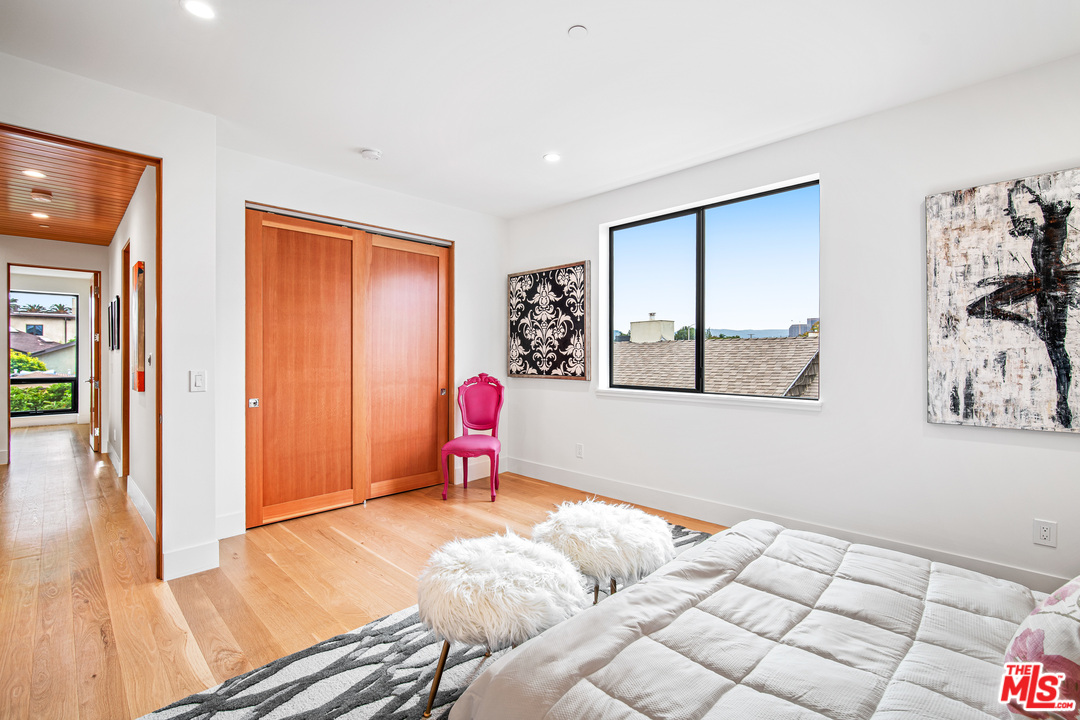 11519 Mississippi Avenue Los Angeles, CA 90025 - Photo 38 of 45 a bedroom with a bed and a window