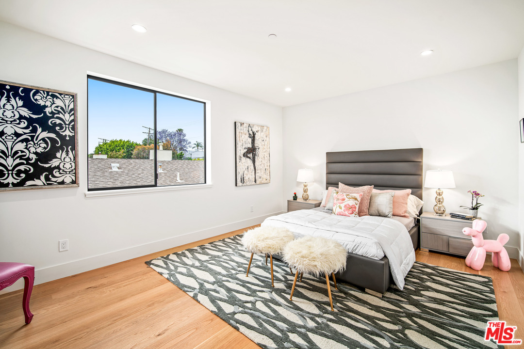 11519 Mississippi Avenue Los Angeles, CA 90025 - Photo 39 of 45 a bedroom with a bed and a window