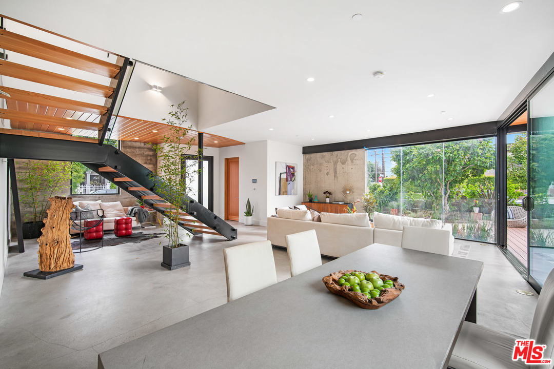 11519 Mississippi Avenue Los Angeles, CA 90025 - Photo 6 of 45 a living room with furniture and a large window
