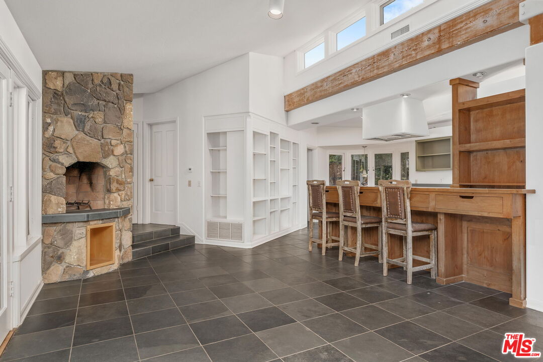 310 McKee Street Ojai, CA 93023 - Photo 13 of 33 a view of a kitchen with dining area and windows