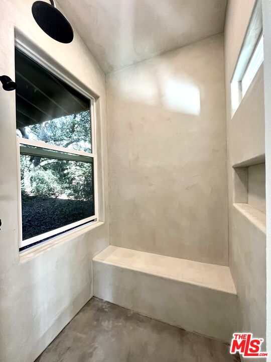 310 McKee Street Ojai, CA 93023 - Photo 27 of 33 a bathroom with a bathtub and a window