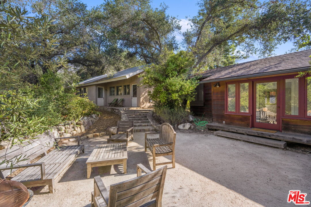 310 McKee Street Ojai, CA 93023 - Photo 32 of 33 a view of a house with backyard and sitting area
