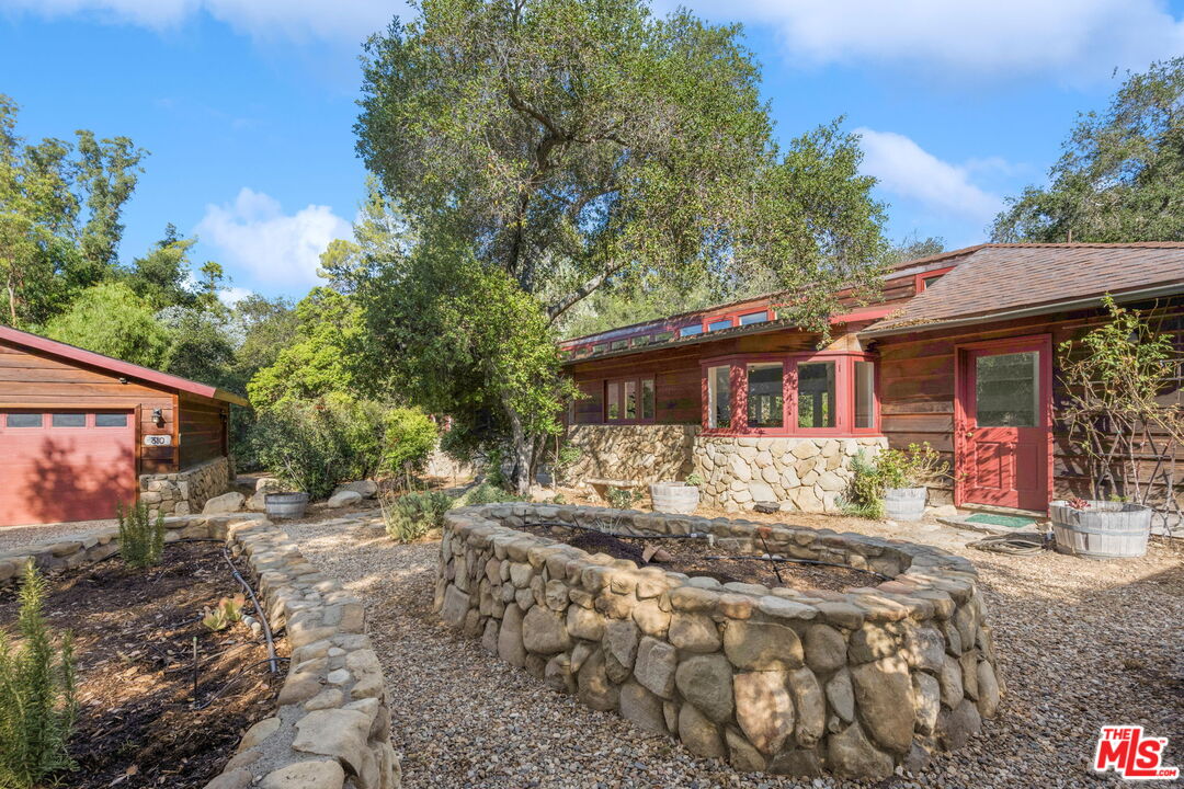 310 McKee Street Ojai, CA 93023 - Photo 5 of 33 a front view of a house with a yard