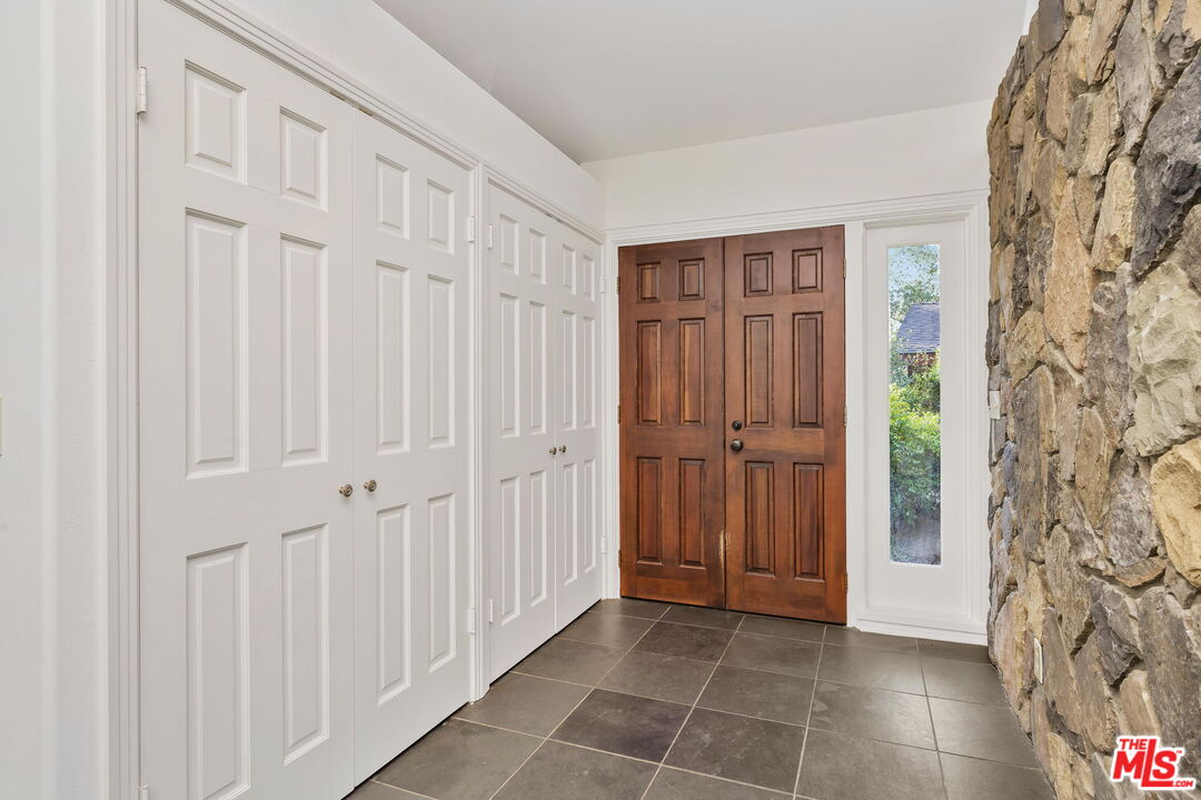 310 McKee Street Ojai, CA 93023 - Photo 7 of 33 a view of a hallway with wooden floor and entryway
