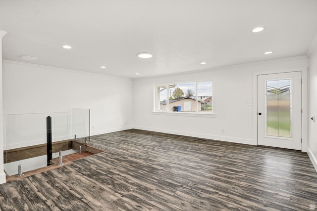 4155 Johnson Road Nibley, UT 84321 - Photo 6 of 71 Unfurnished living room featuring dark wood finished floors, recessed lighting, and crown molding