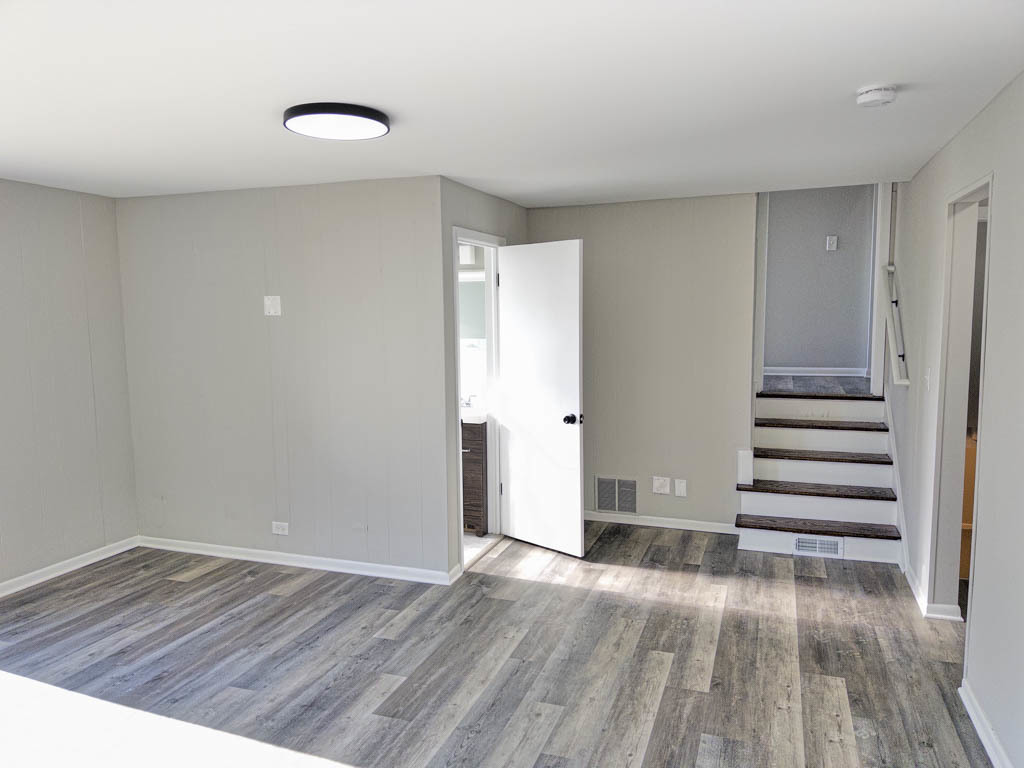 5633 Murray Drive Berkeley, IL 60163 - Photo 7 of 17 a view of empty room with wooden floor