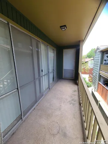 a bathroom with a toilet and a bathtub