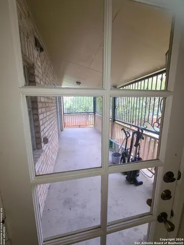 a bathroom with a double vanity sink and a shower