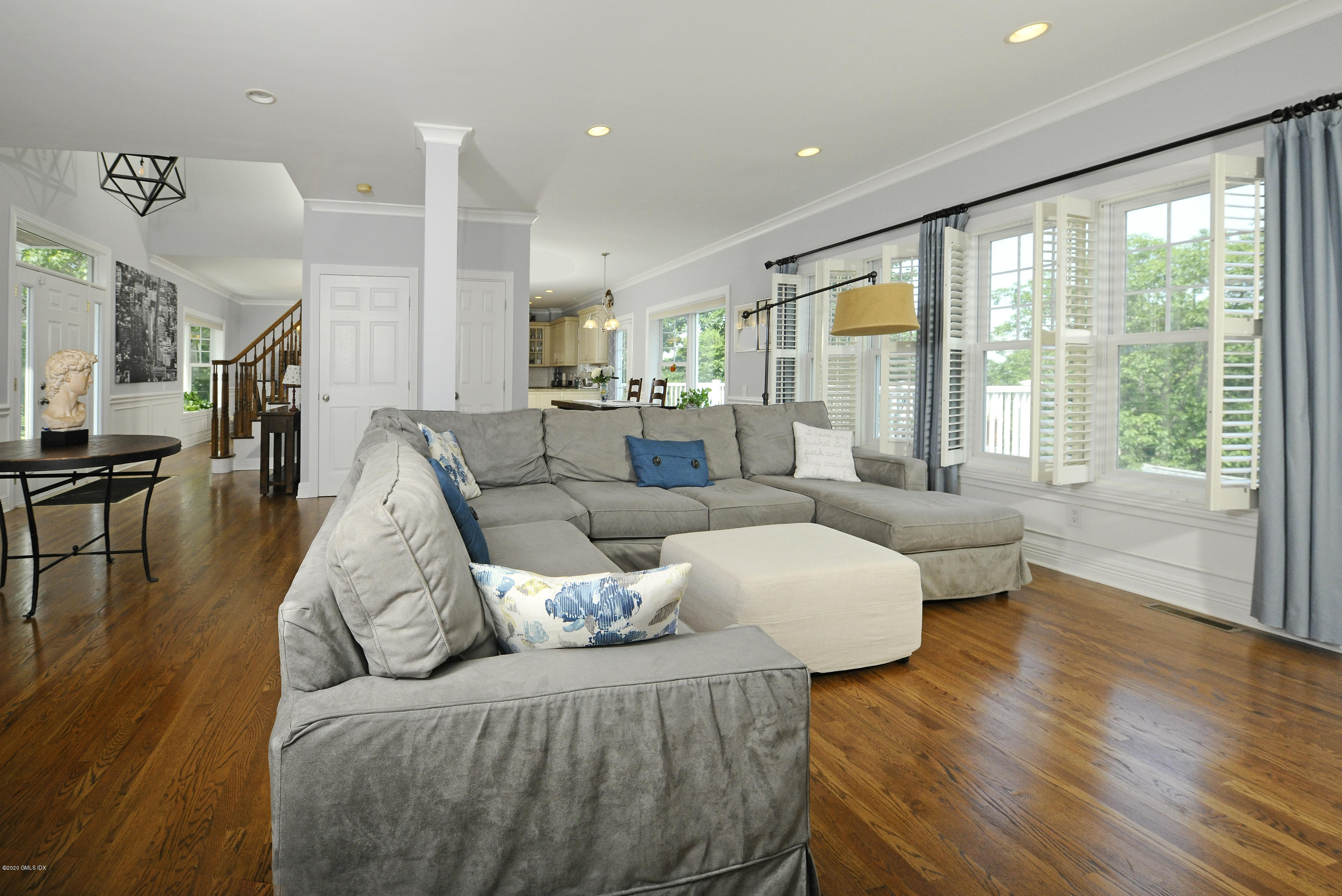 8 View Street, Unit 5 Greenwich, CT 06830 - Photo 11 of 30 a living room with furniture and a large window