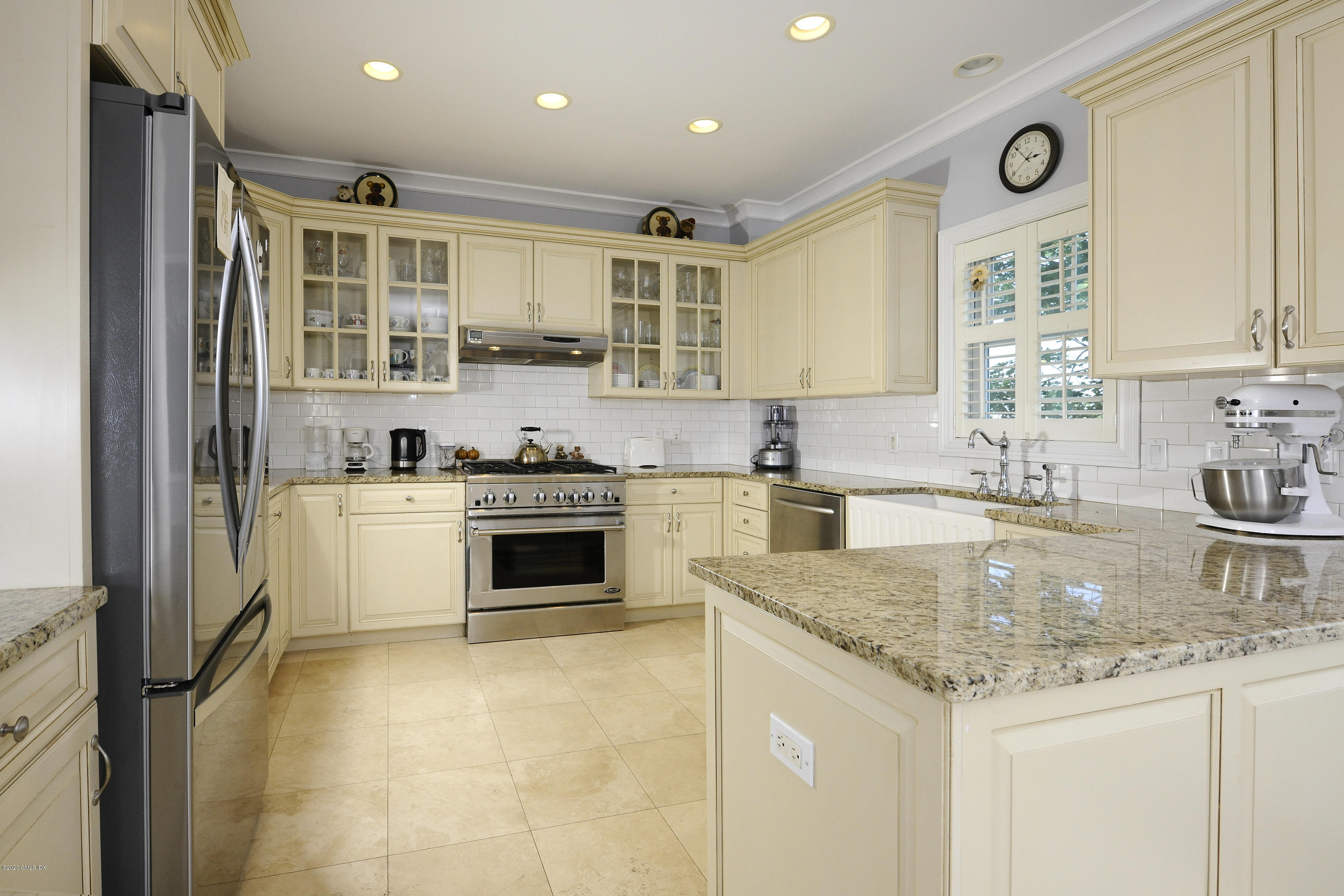 8 View Street, Unit 5 Greenwich, CT 06830 - Photo 16 of 30 a kitchen with granite countertop a sink stainless steel appliances and cabinets