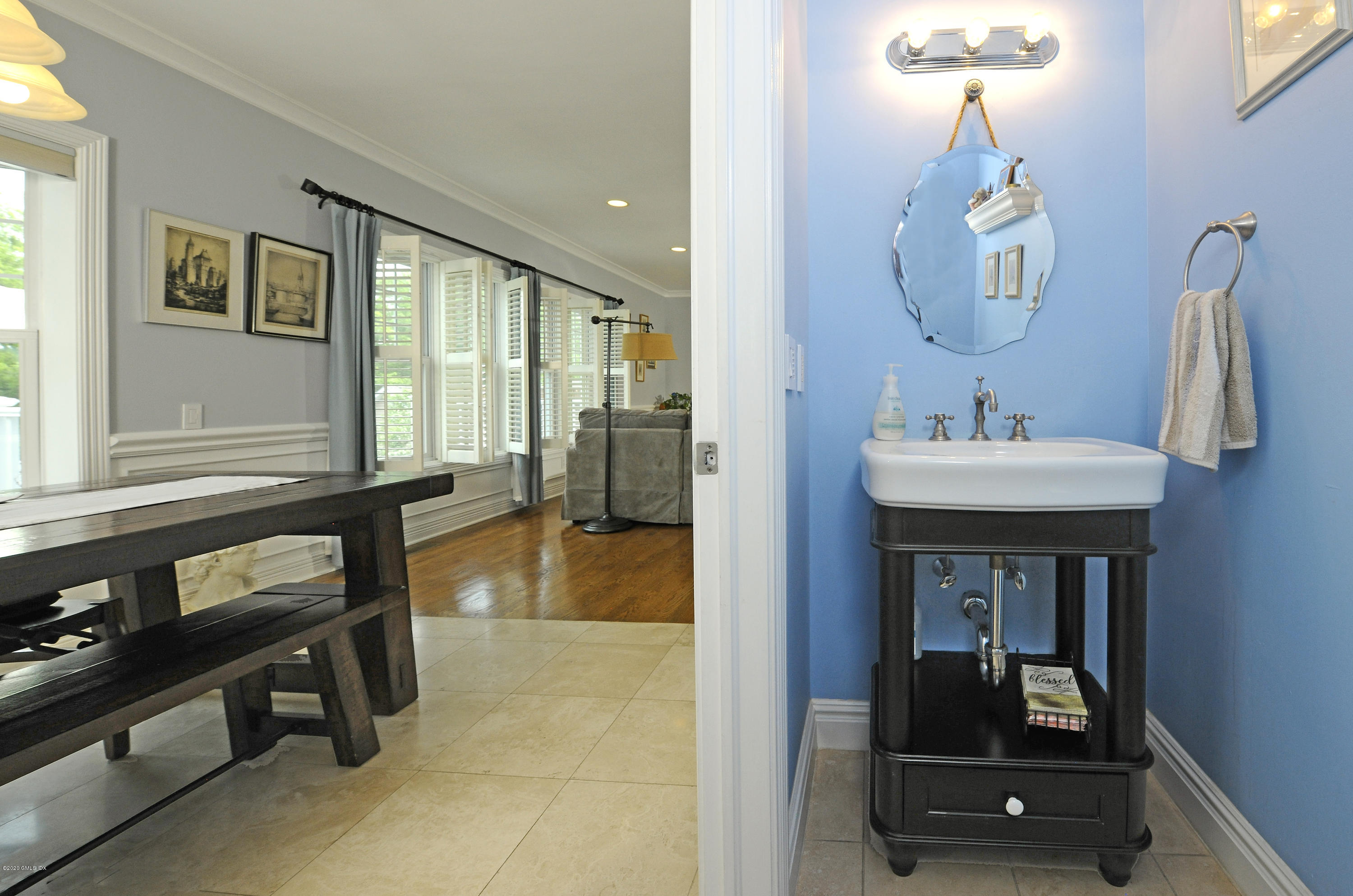 8 View Street, Unit 5 Greenwich, CT 06830 - Photo 17 of 30 a bathroom with a sink and a mirror