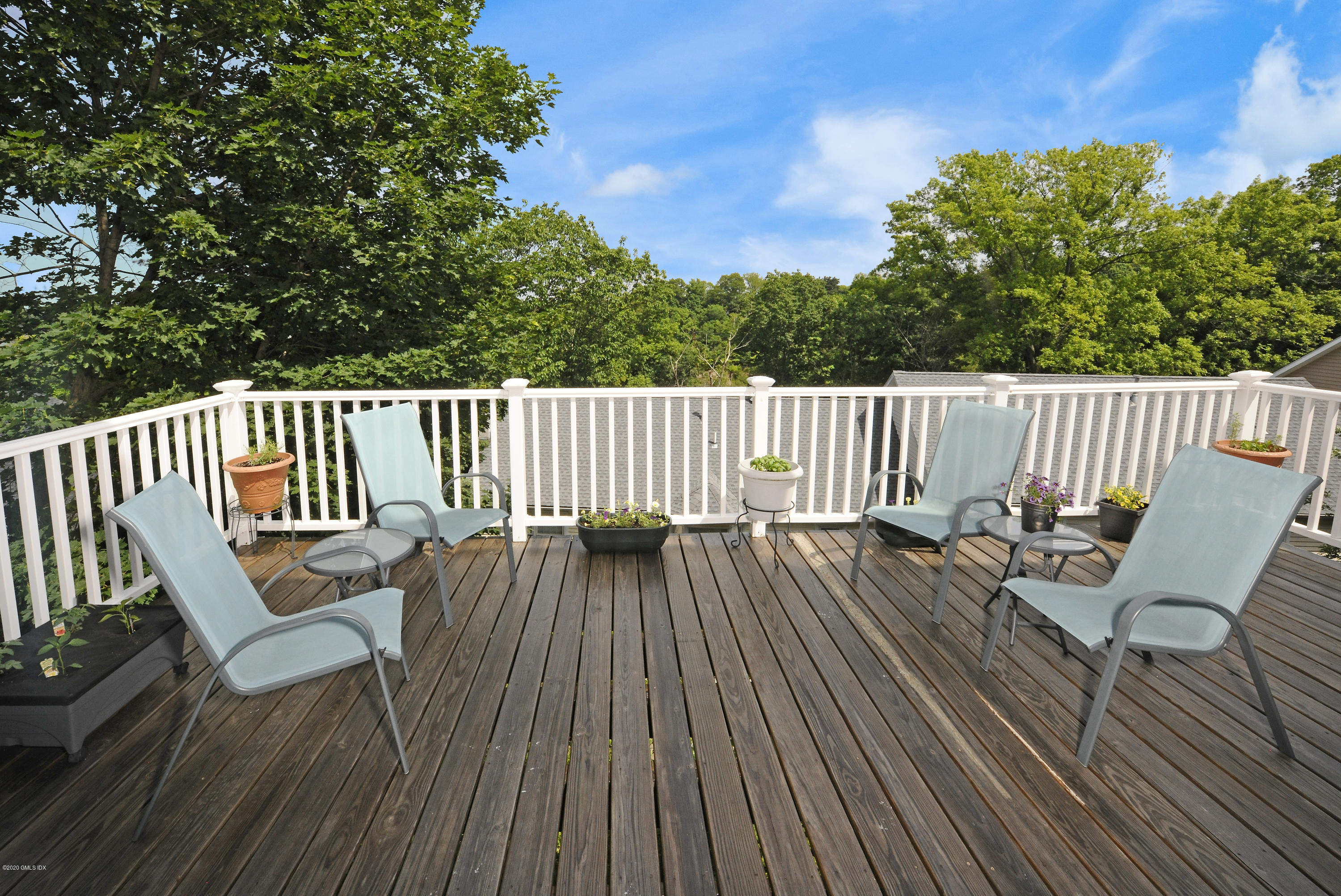 8 View Street, Unit 5 Greenwich, CT 06830 - Photo 18 of 30 a view of balcony with deck and wooden floor