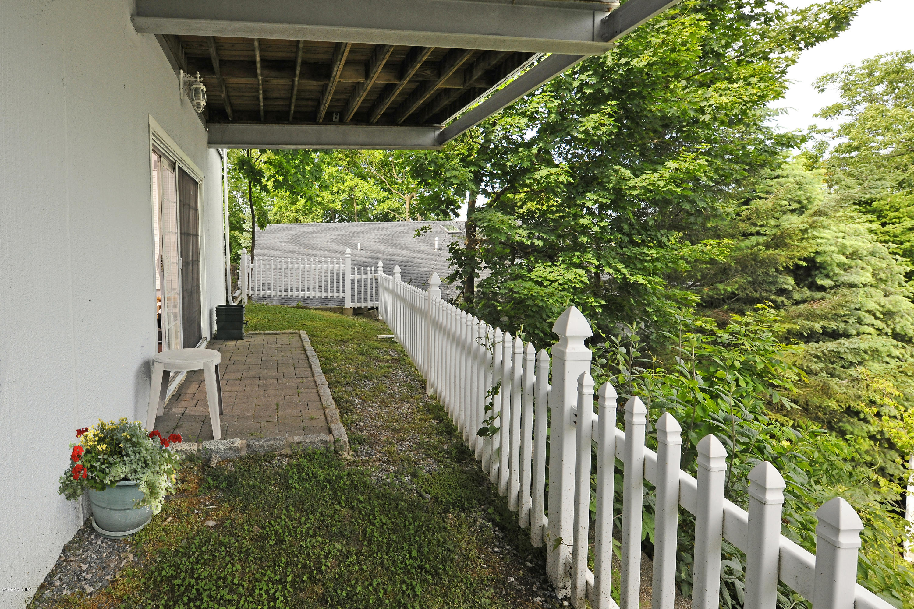 8 View Street, Unit 5 Greenwich, CT 06830 - Photo 28 of 30 a view of a backyard with pathway