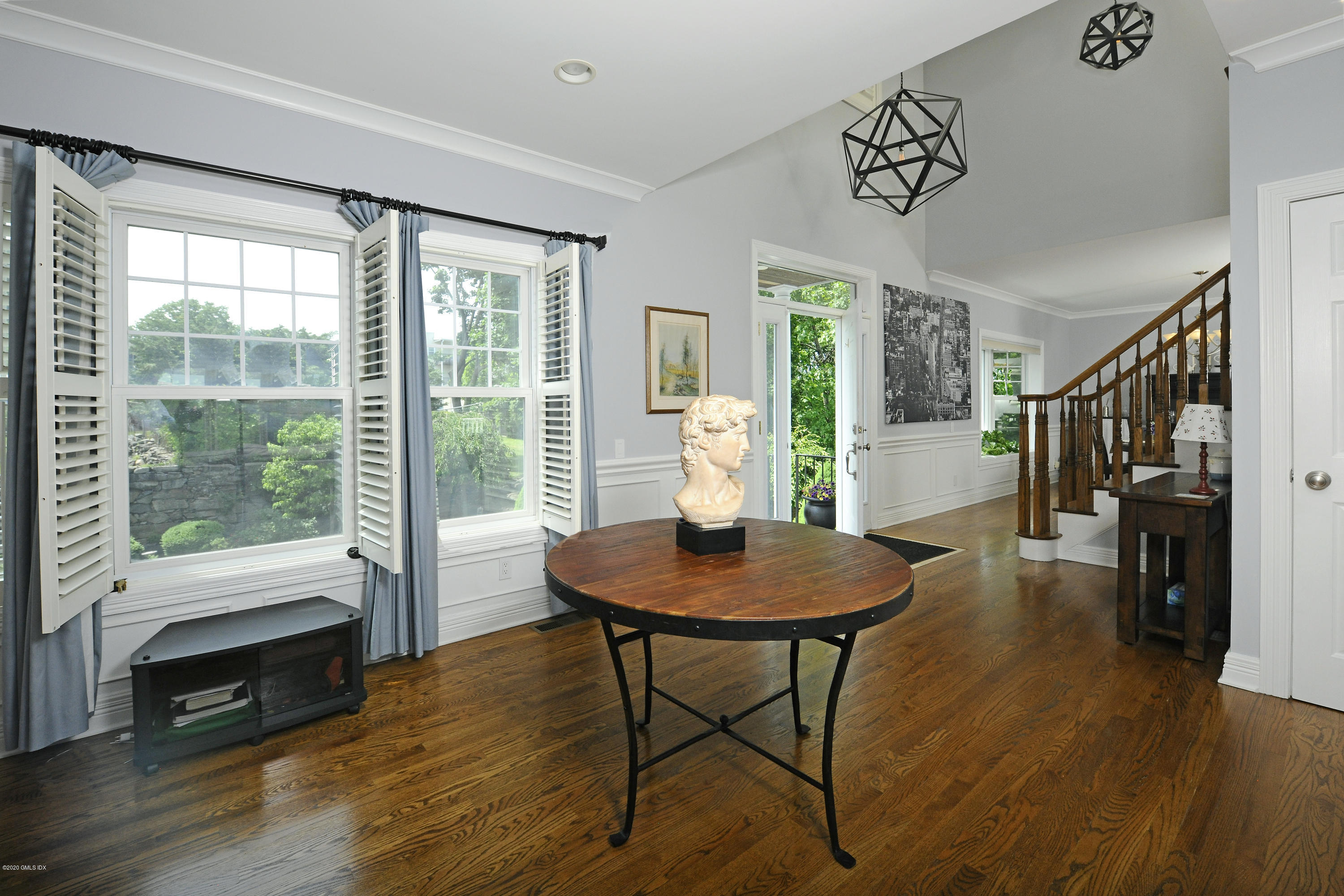 8 View Street, Unit 5 Greenwich, CT 06830 - Photo 8 of 30 a living room with furniture and a wooden floor