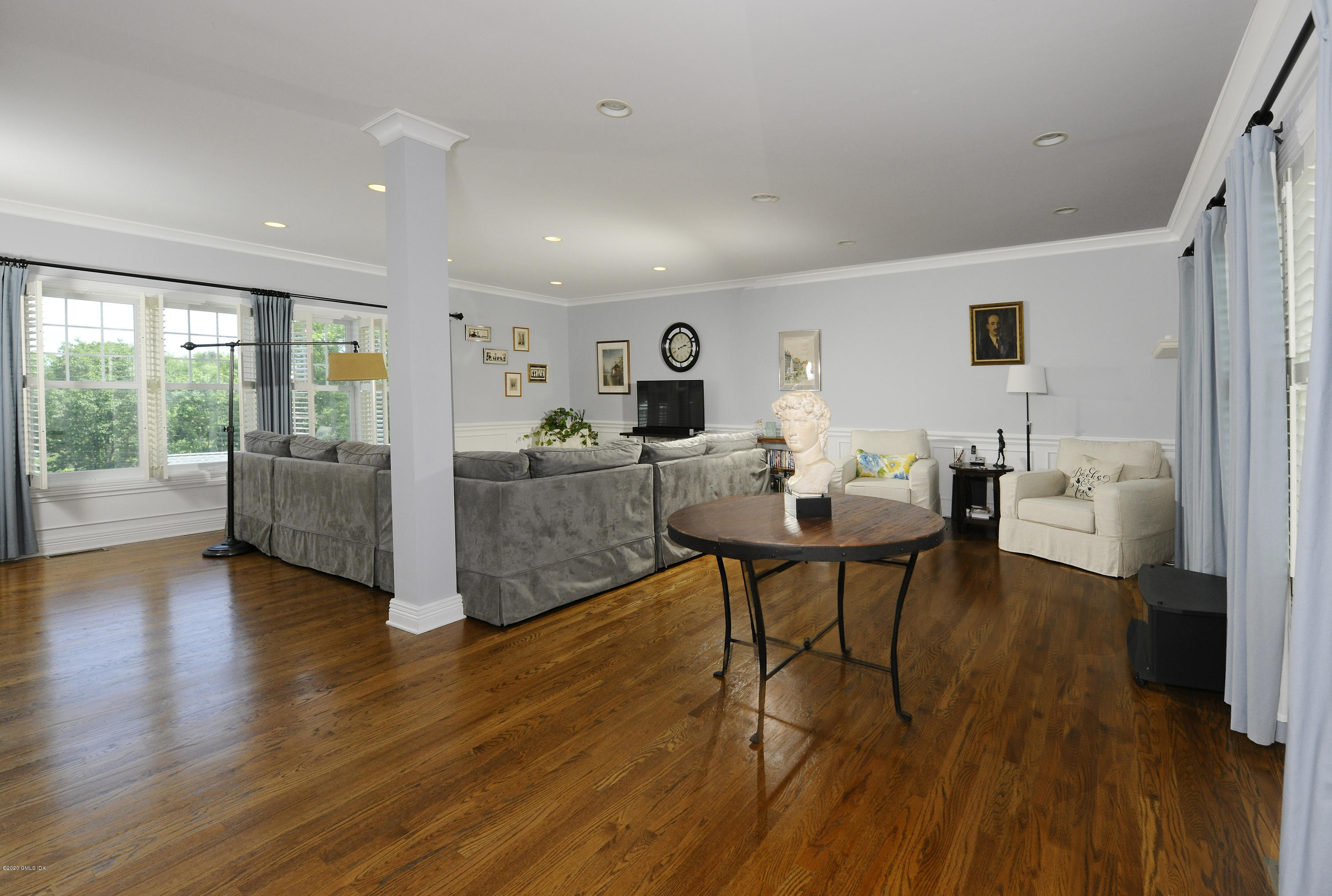 8 View Street, Unit 5 Greenwich, CT 06830 - Photo 9 of 30 a living room with furniture and a wooden floor