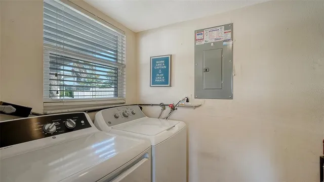 a view of backyard of a house