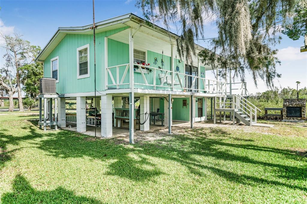 2220 Coon Point Crystal River, FL 34429 - Photo 22 of 58 a view of a house with a yard