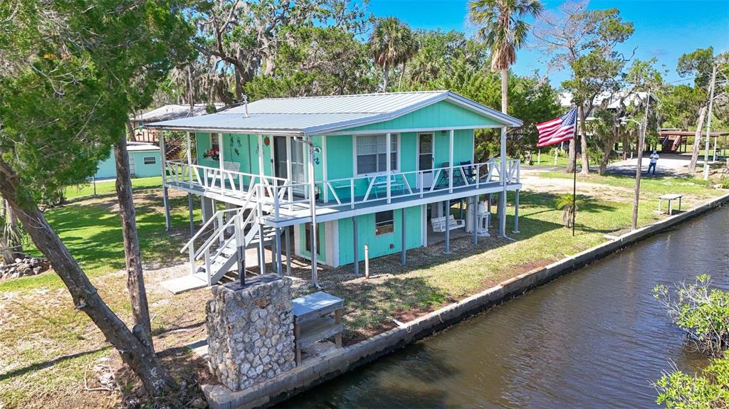 2220 Coon Point Crystal River, FL 34429 - Photo 43 of 58 a view of a house with pool and wooden floor