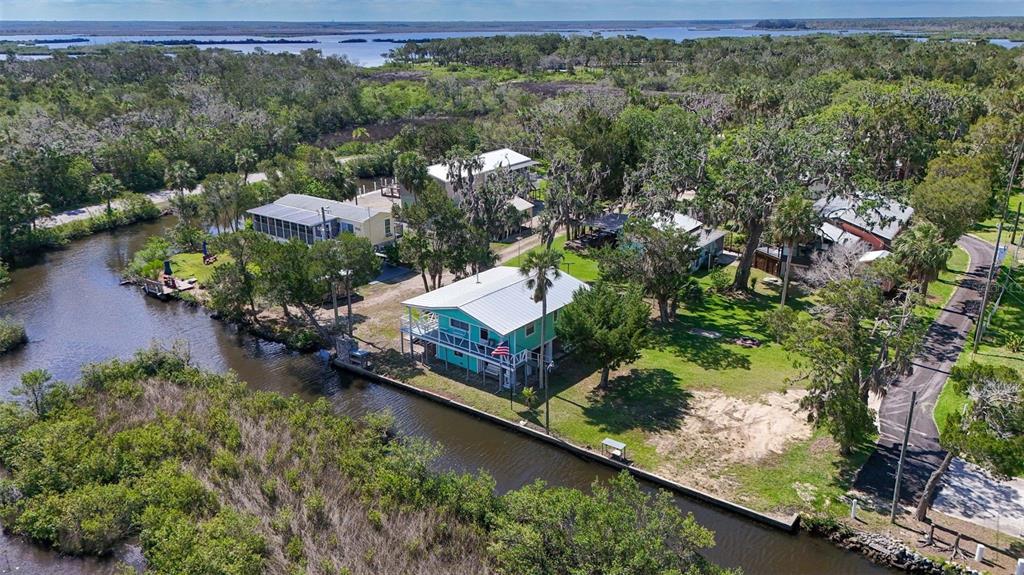 2220 Coon Point Crystal River, FL 34429 - Photo 46 of 58 an aerial view of a house with a yard