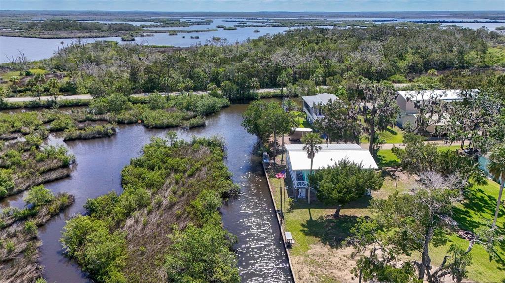 2220 Coon Point Crystal River, FL 34429 - Photo 47 of 58 an aerial view of a house with a yard