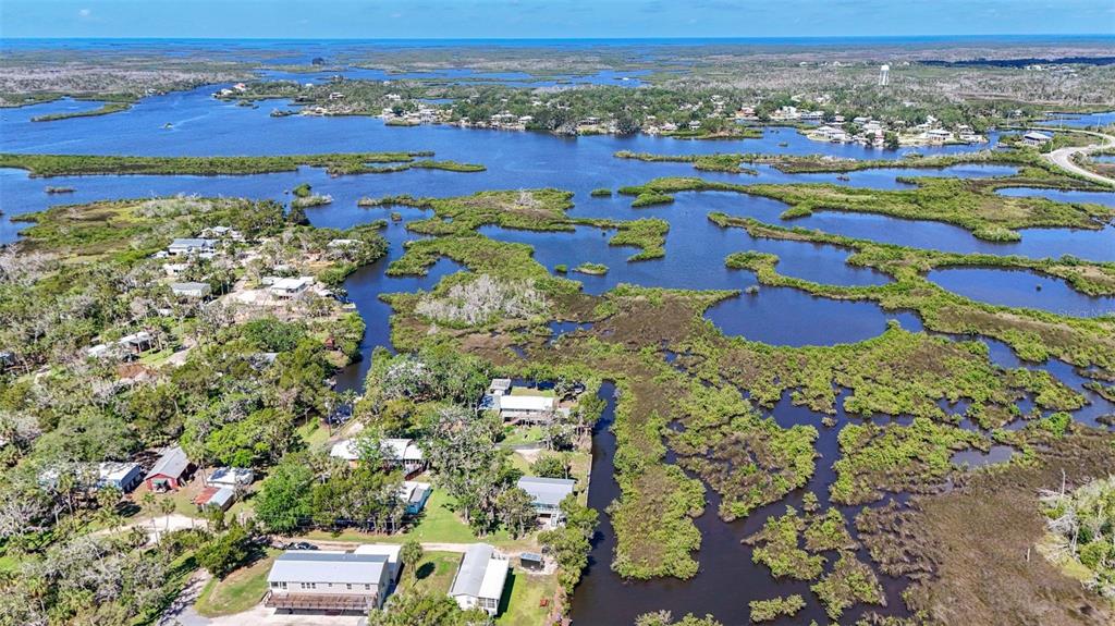 2220 Coon Point Crystal River, FL 34429 - Photo 52 of 58 an aerial view of residential houses with outdoor space