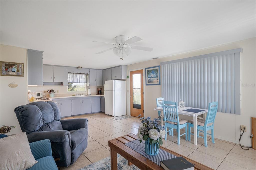 2220 Coon Point Crystal River, FL 34429 - Photo 7 of 58 a living room with furniture and a large window