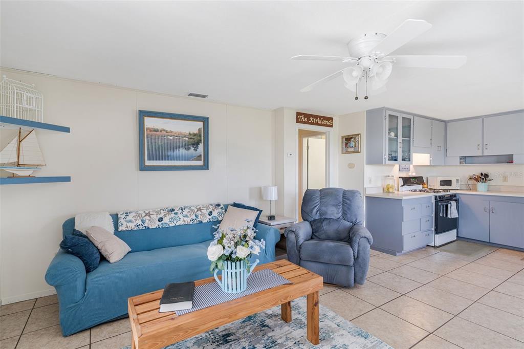 2220 Coon Point Crystal River, FL 34429 - Photo 9 of 58 a living room with furniture and kitchen view