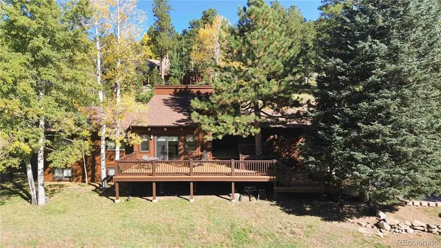 a view of swimming pool and mountain in the background