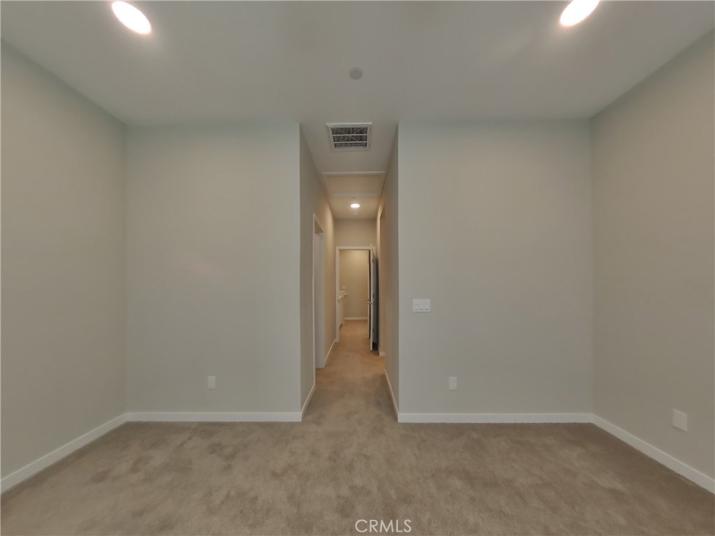 24931 Padre Court Wildomar, CA 92595 - Photo 4 of 24 a view of an empty room and window