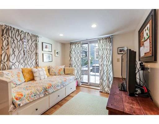 238 Hale Street Beverly, MA 01915 - Photo 11 of 30 a living room with furniture and a flat screen tv