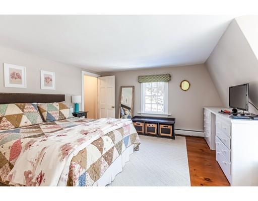 238 Hale Street Beverly, MA 01915 - Photo 16 of 30 a bedroom with a bed and a couch