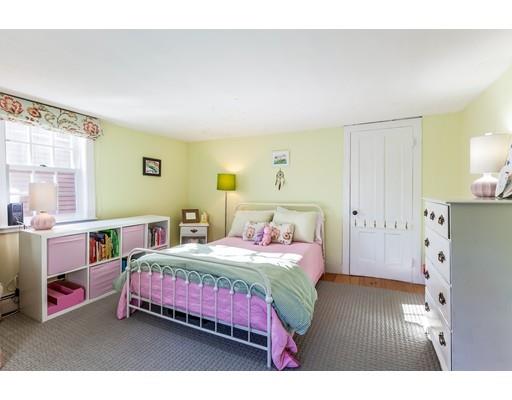 238 Hale Street Beverly, MA 01915 - Photo 19 of 30 a bedroom with a bed and a dresser