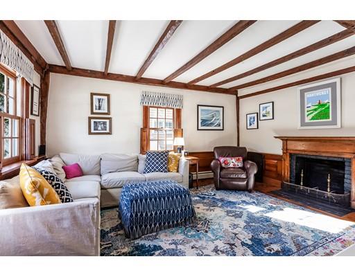 238 Hale Street Beverly, MA 01915 - Photo 6 of 30 a living room with furniture and a fireplace
