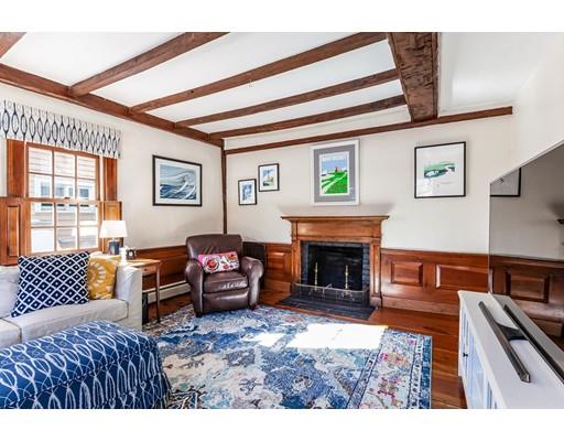 238 Hale Street Beverly, MA 01915 - Photo 7 of 30 a living room with furniture and a fireplace